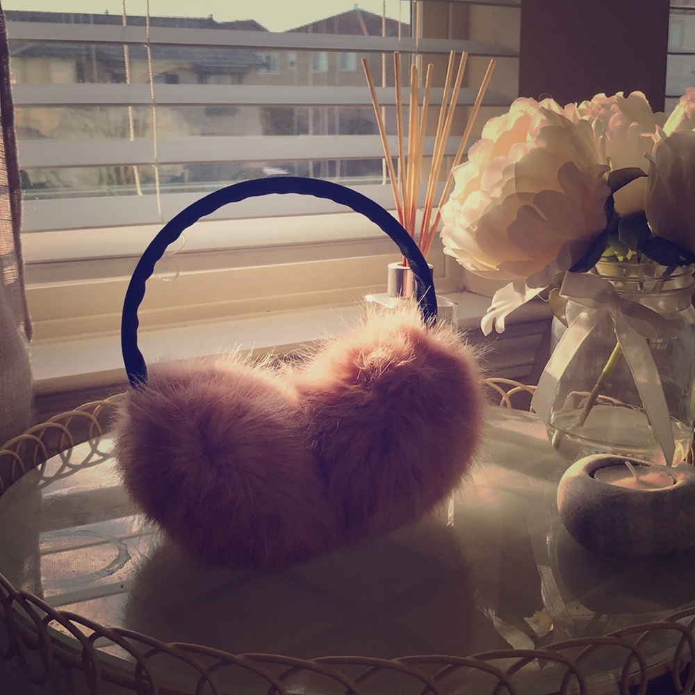 Pink fluffy earmuffs